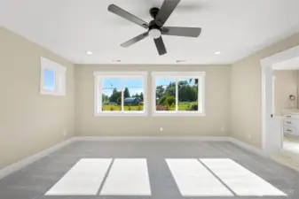 The primary bedroom & bathroom
