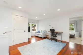 The bedroom is pictured off to the right.