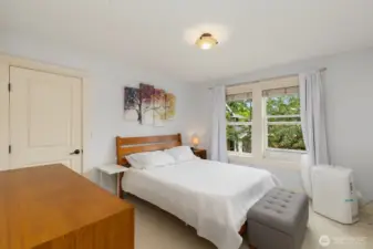 Bedroom with even more storage! The bathroom entrance is just to the right.