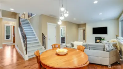 Open & bright breakfast nook off kitchen has maple hardwood floors. Newer high-end carpet upstairs with custom handrail.