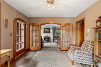 The 1928 Brick Tudor home maintains its mahogany trim, rounded French doors, original glass in the front windows. Timeless!