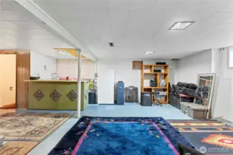 The partially finished basement in the 1928 Tudor is perfect for recreating, hanging out, hobbies, storage - and also has it's own .5 bath.