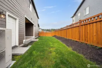 Fully fenced yard with easy low maintenance yard work.