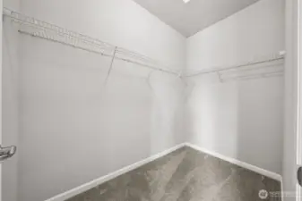 Primary suite XL walk-in closet.