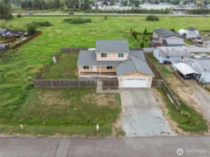 View of lot and large front yard.