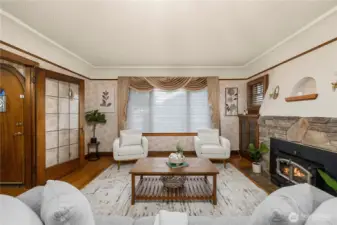 Wall sconces, glitter and glam in the fireplace surroundings, custom woodwork,