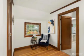 Sitting area w/wall pull out ironing board