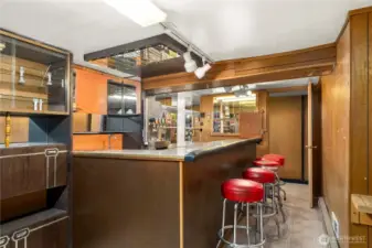 Basement fun! Full bar w/shelving for your booze and soda machine