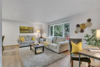 Open concept living room wlots of light