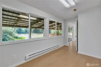 Bedroom 4 located downstairs w/waterfront view.