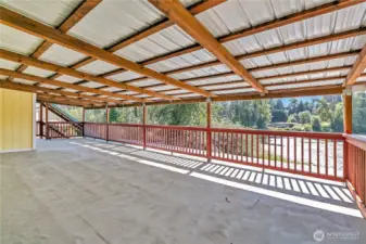 Oversized covered deck main floor w/views of lake.
