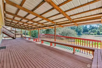 Lower deck w/ramp access to lower level & stairs to upper deck.