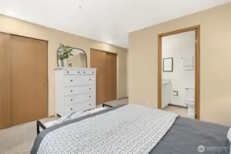 Two large closet spaces with built in shelving.