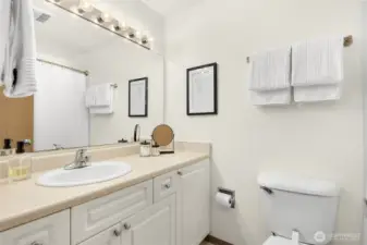 Primary bathroom with plenty of counter space + massive mirror. (21 & 24 need to be switched)