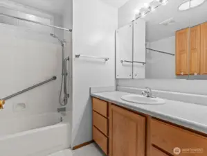 Just down the hall is the conveniently located bathroom.