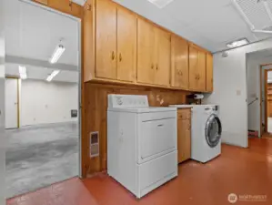 The laundry room is huge. There's access to the side driveway as well.