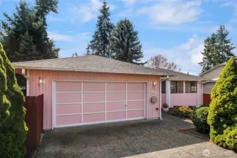 2 Car Attached Garage with Storage and Parking Space for 2 Cars in Driveway