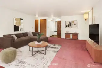 View of Living Room to Entry with Skylight