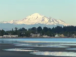 Majestic Mt. Baker rises above Birch Bay at low tide which provides 750+ acres of  fun sandy shoreline