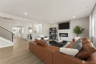Very open great room - virtually staged.