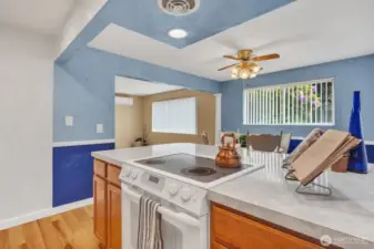 Kitchen is open to dining room and living room.