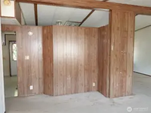 Kitchen behind the wall.