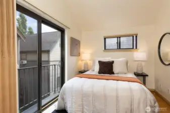 Secondary bedroom with vaulted ceilings
