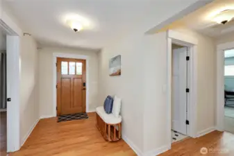 Entry, primary bedroom to the left, second bedroom, full bath to the right.