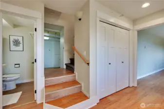 Down the stairs to bonus room, bedroom, 1/2 bath and laundry.