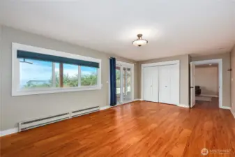 Downstairs bedroom with access to back yard.