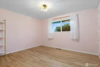 Bedroom two, you'll love the pretty wall paper in here. You'll have to see it for yourself!