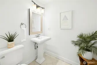 Main floor powder room just off the entry.