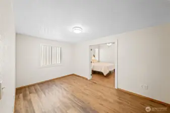 Office/den/flex room leading to the main floor primary addition has a large closet