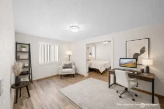 This flex space makes a great office, as it is virtually staged in this photo