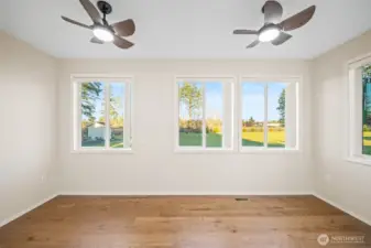 Last room of the main floor addition is a bonus space that would make a great craft room with all of the windows. Or office.