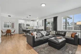 Nice view of your open-concept living, large patio doors leading to your covered patio and private back yard.