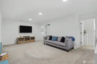 View of your massive loft as you reach the top of the stairs.