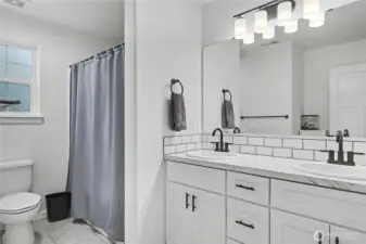Upstairs kids/guest full bath, double vanity!