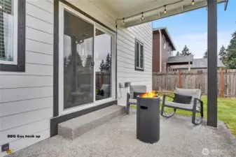 View of your back patio, plumbed for propane gas hookup for your grill or patio heater.