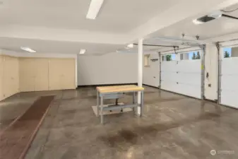 Spacious garage with radiant heat, and a bathroom. room for hobbies!