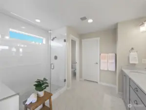 Frameless glass walk in shower.