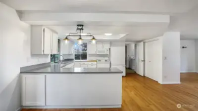 This bright kitchen has plenty of storage and counter space!