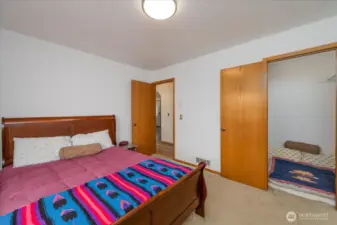 Guest bedroom with large walk-in-closet.