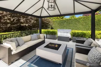 Covered Deck Space with Fireplace and Fountain