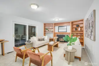 Den opening to expansive backyard