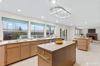 Yes two massive islands along with two sinks makes this oversized kitchen a chef's dream!