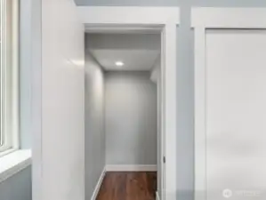 Large under stairs closet.