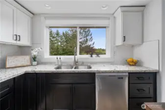 Kitchen window overlooks the backyard w/ gorgeous Mt. Views