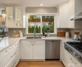 Lighted White Cabinets with Designer Glass