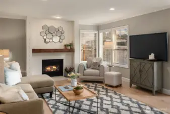 Family Room Features a Woodburning Fireplace - Open floor Plan